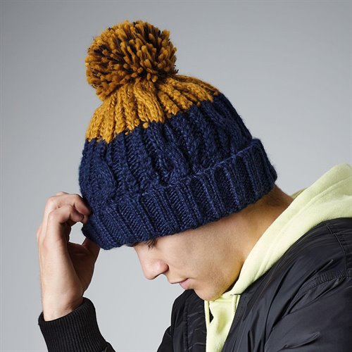 Berretto con pon pon
